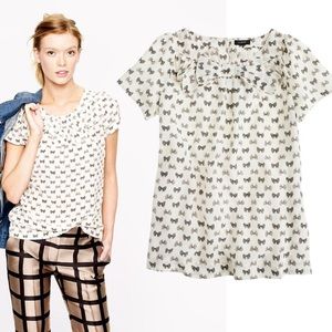J Crew Factory Bow neck and bow print blouse.
